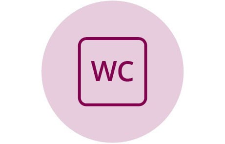 WC-symbol i gul cirkel.
